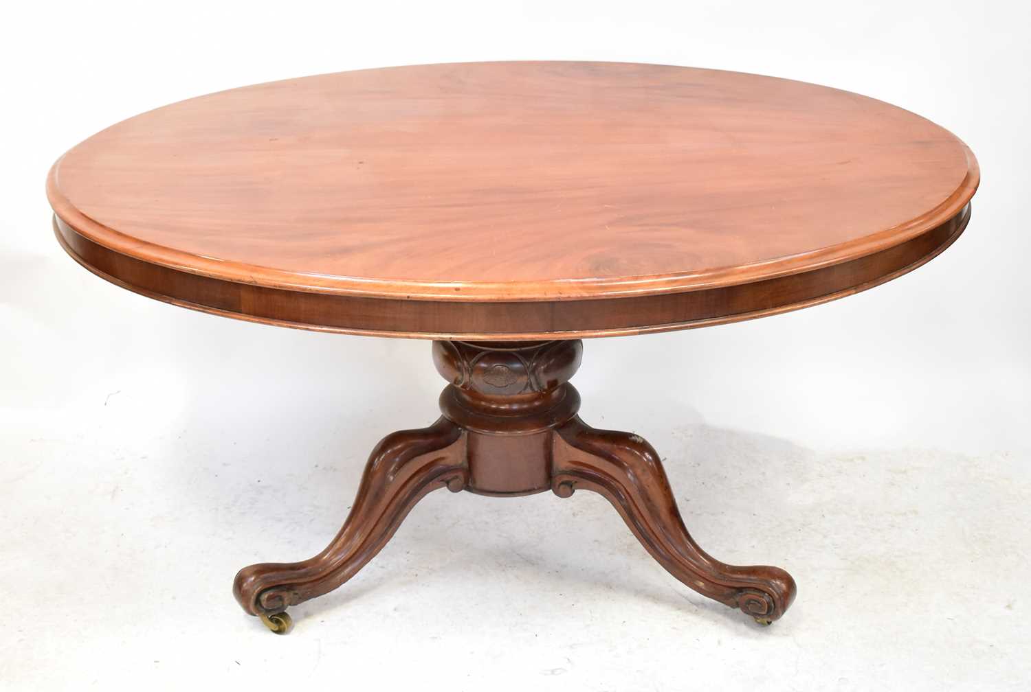 A Victorian mahogany oval tilt-top loo table on bulbous carved base with tripod cabriole legs, 72 - Image 2 of 2