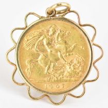 An Edward VII 1907 half sovereign, London Mint, George and Dragon, within a 9ct gold necklace