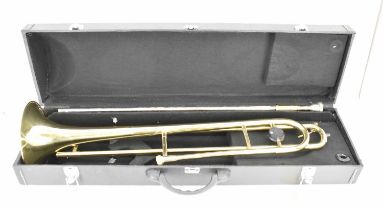 A brass trombone, in hard carry case, marked 'FF'.