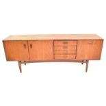 VICTOR WILKINS FOR G-PLAN; a 1960s Brasilia model 4058 teak sideboard, with double cabinet flanked