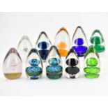 Ten cone-shaped glass paperweights, various colours and designs, average height 10cm (10). Condition