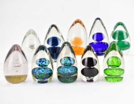 Ten cone-shaped glass paperweights, various colours and designs, average height 10cm (10). Condition