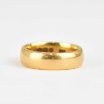 A 22ct gold wedding band, size H, approx. 5.7g.