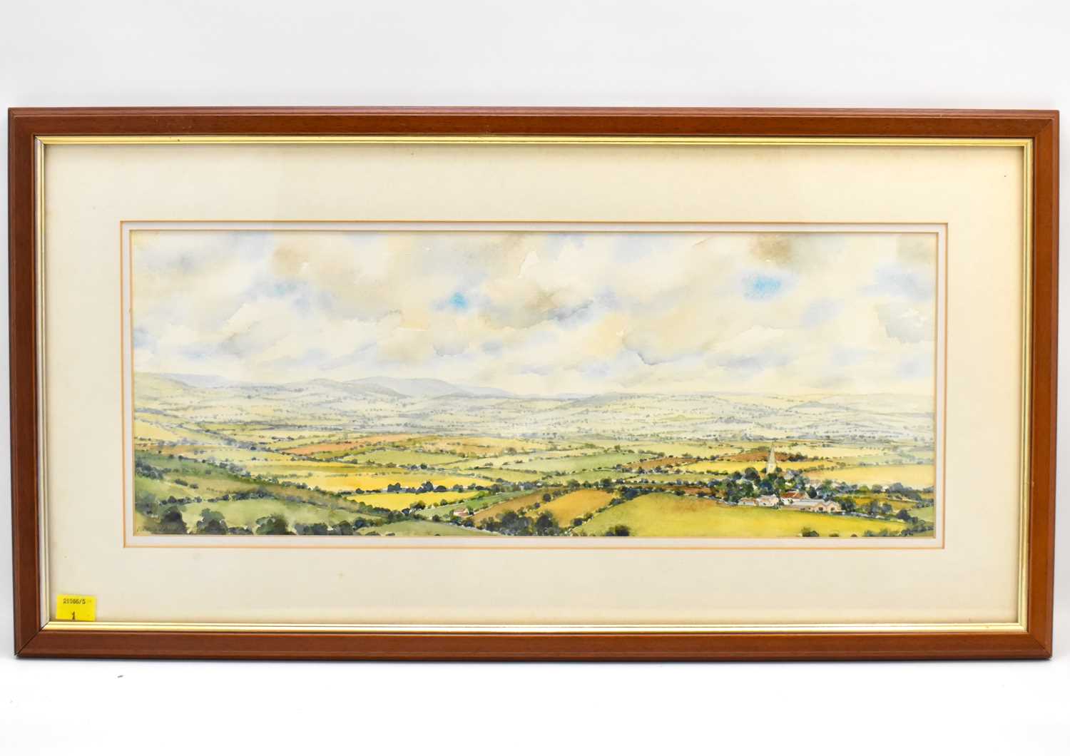 † BEVERLEY BLACK; watercolour on paper, a Herefordshire panoramic landscape of hills, church spire