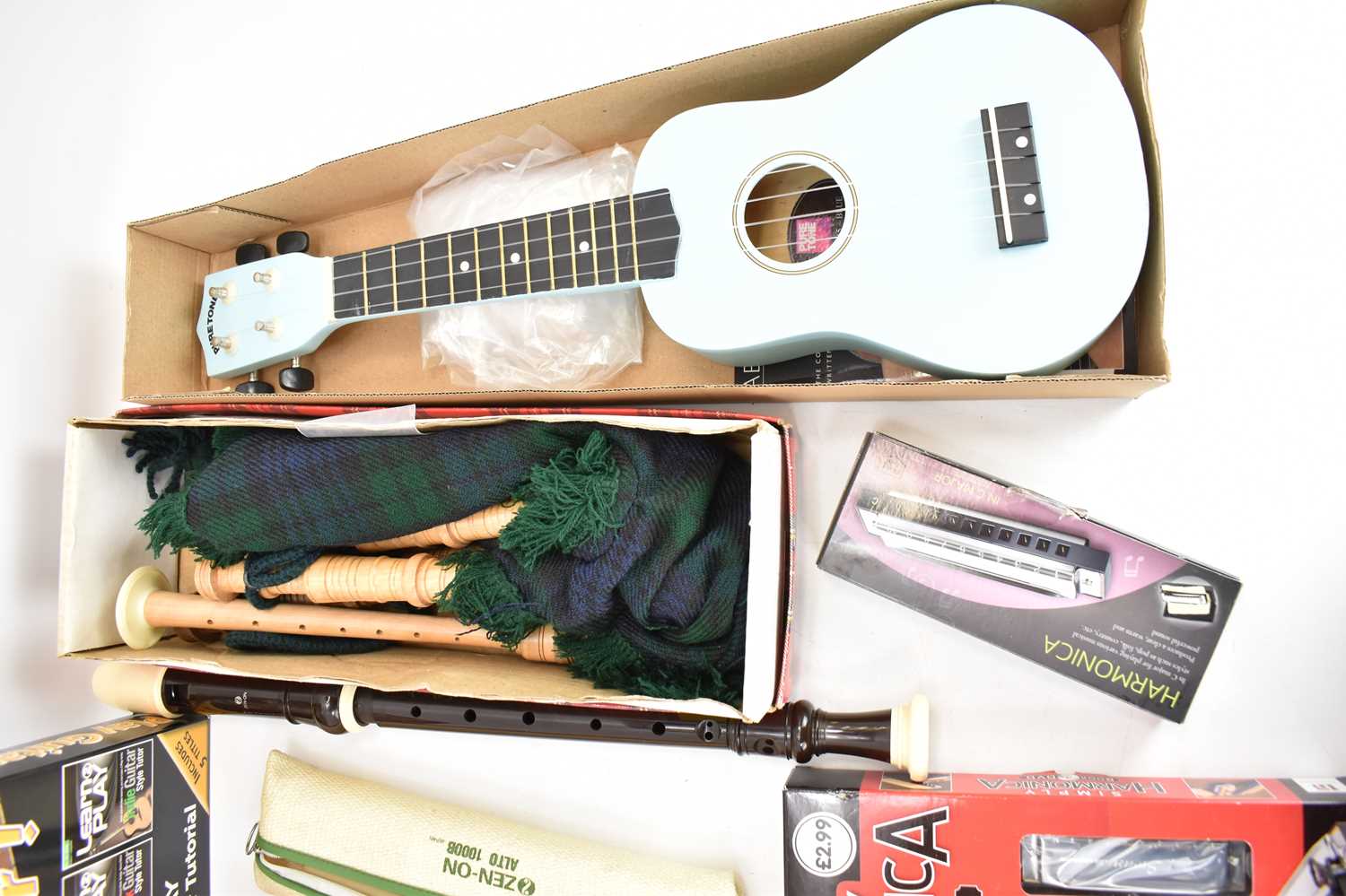A mixed lot of mainly beginner's musical instruments, etc, comprising boxed junior bagpipes, a boxed - Image 2 of 3