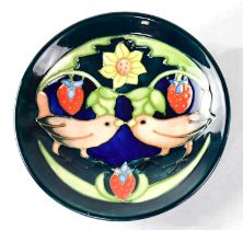 MOORCROFT; a circular dish in the 'Strawberry Thief' design, copyrighted for 1995, with impressed