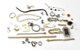 A quantity of costume jewellery to include a silver cased and enamelled fob watch, several pewter