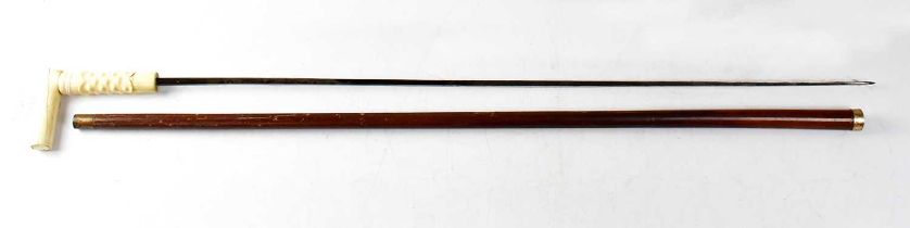 A Victorian malacca shafted yellow metal collared bone-handled sword stick with blued decoration