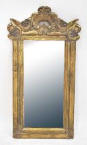 An Eastern carved gilt painted wooden wall-hanging mirror with Rococo-style decoration, 120 x