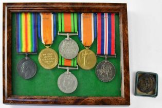 A group of WWI and WWII medals comprising British War Medal 1914-18 and Victory Medal awarded to Pte