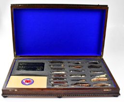 A collection of various pen knives, Scout knives, military jack knives and others, enclosed within