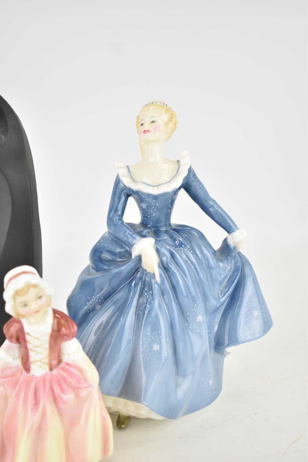 ROYAL DOULTON; three porcelain figures comprising HN2334 'Fragrance', height 19cm, HN2120 'Dinky - Image 3 of 4