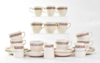 ELDER DEMPSTER LINES; a part tea set with cream ground and floral band, comprising twelve