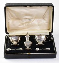 EDWARD BARNARD & SONS; a matched hallmarked silver cruet set, comprising salt, pepperette and lidded