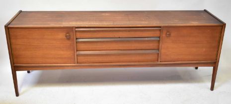 YOUNGER; a 1960s teak sideboard, with three long central drawers flanked by cupboards, raised on