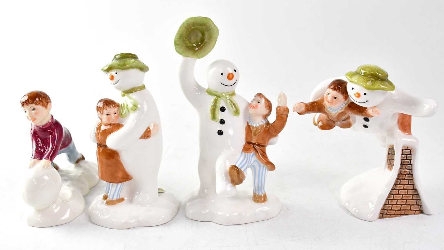 THE SNOWMAN; four John Beswick figures, comprising JBS1 'Snowman and James Flying', height 11cm,