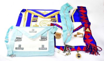 A group of Masonic regalia, comprising three aprons, one inscribed 'East Lancashire Asst', three
