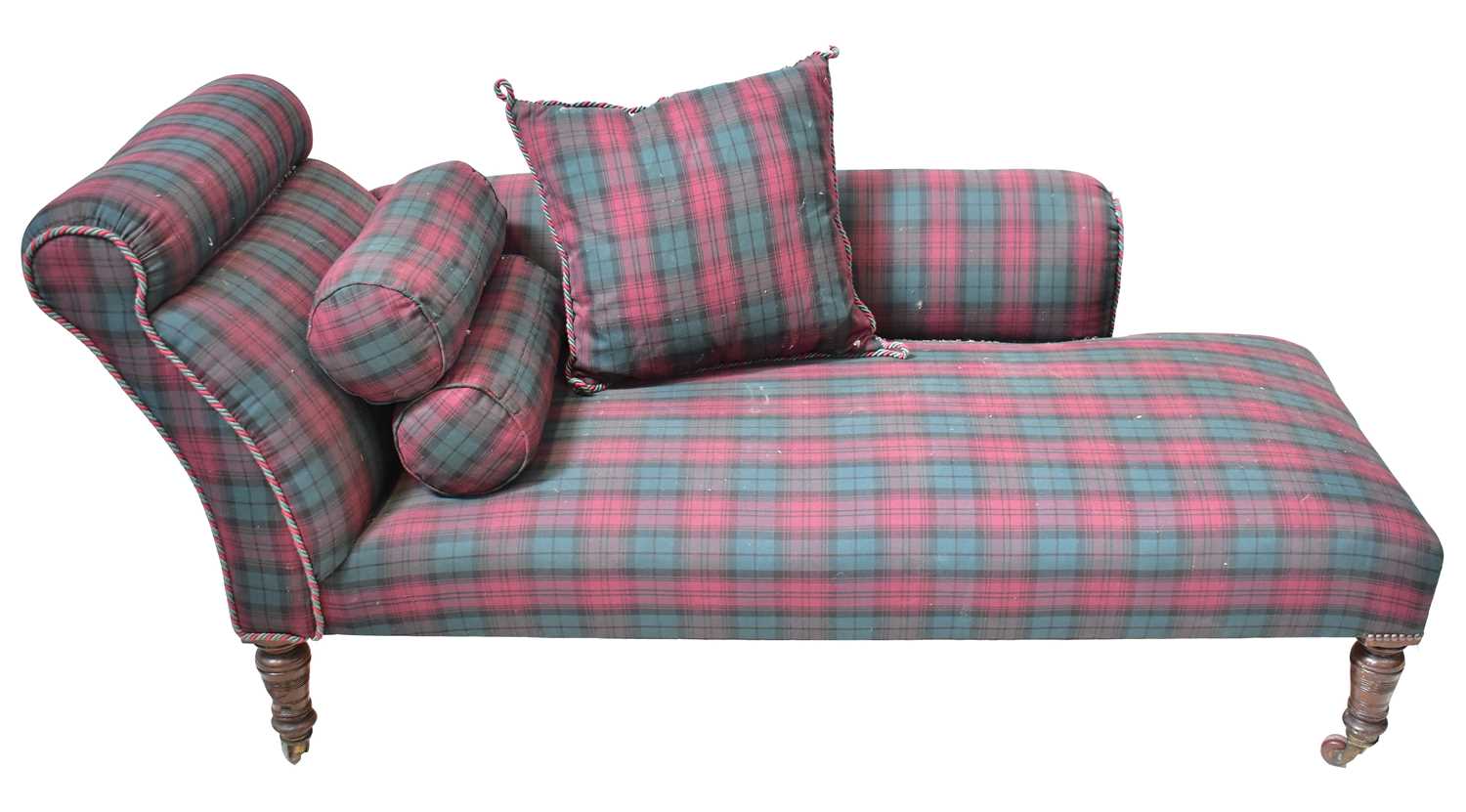 An Edwardian mahogany chaise longue upholstered in a green and maroon tartan fabric, on turned