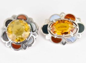 Two 19th century style silver and polished agate Scottish brooches, one 4.5cm diameter, the other