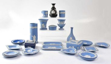 WEDGWOOD; a collection of jasperware, mainly in pale blue, comprising vases, pin dishes, and covered
