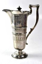 JOSEPH RODGERS & SONS; an Edward VII hallmarked silver hot chocolate pot of tapering form, with