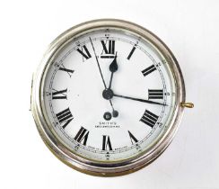 SMITH'S; a brass cased bulkhead clock with chrome plated door bezel, the white enamelled dial set