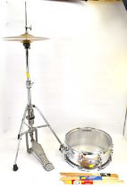 A performance percussion snare drum, 17 x 36cm, a Stagg hand made 13" hi-hat medium CXH-13 cymbals