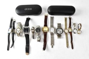 A group of ladies' and gentlemen's fashion wristwatches, to include Guess, Ben Sherman, Pulsar,