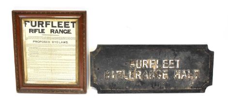 A substantial cast iron sign with embossed lettering 'Purfleet Rifle Range Holt', 40 x 100cm, also a