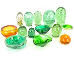 A group of decorative coloured and art glass, comprising seven Victorian green glass dump