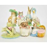BESWICK; seven Beatrix Potter figures comprising 'Hunca Munca', 'Benjamin Bunny', 'Peter Rabbit', '