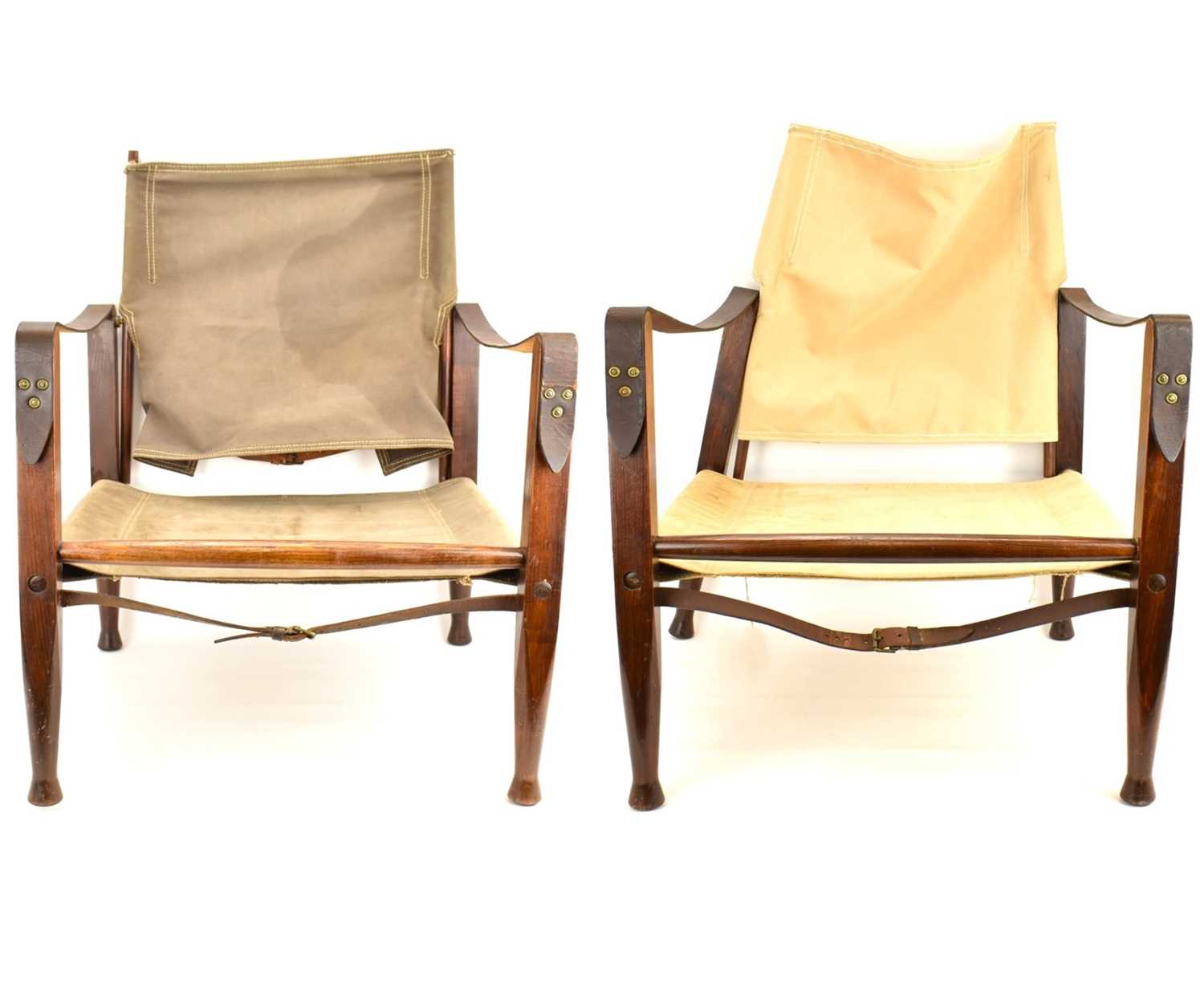 KAARE KLINT, DENMARK; a pair of ash and canvas safari chairs, marked 'Denmark 25160' to back
