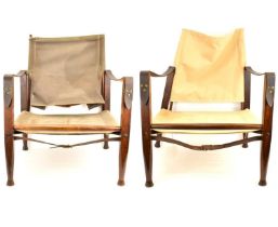 KAARE KLINT, DENMARK; a pair of ash and canvas safari chairs, marked 'Denmark 25160' to back