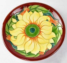 MOORCROFT; a plate in the 'Inca' design, copyrighted for 1994, with impressed and painted marks to