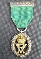 A Victorian silver Volunteer Officer's decoration with VR cypher, London 1892, presented to