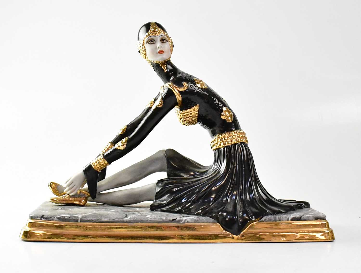 PORCELLANA ESTER BASSANO; a limited edition Art Deco style figure of a seated dancer in black dress,