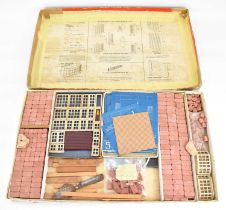 BRICKPLAYER; 'The Bricks and Mortar Building Kit No. 4', comprising composite bricks of various