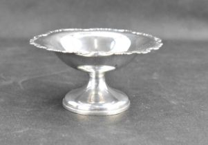 GOLDSMITHS AND SILVERSMITHS CO LTD; a small George V hallmarked silver pedestal sweetmeat dish, with