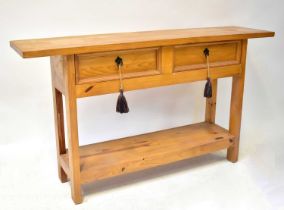 A pine hall table with a pair of drawers above undershelf, 76 x 135 x 34cm. Condition Report: From