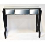 A mirrored side table with single drawer, to tapering supports, 81 x 95.5 x 45cm. Condition