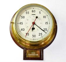 SMITH'S; an Admiralty pattern marine Astral brass cased bulkhead clock with red seconds hand, the