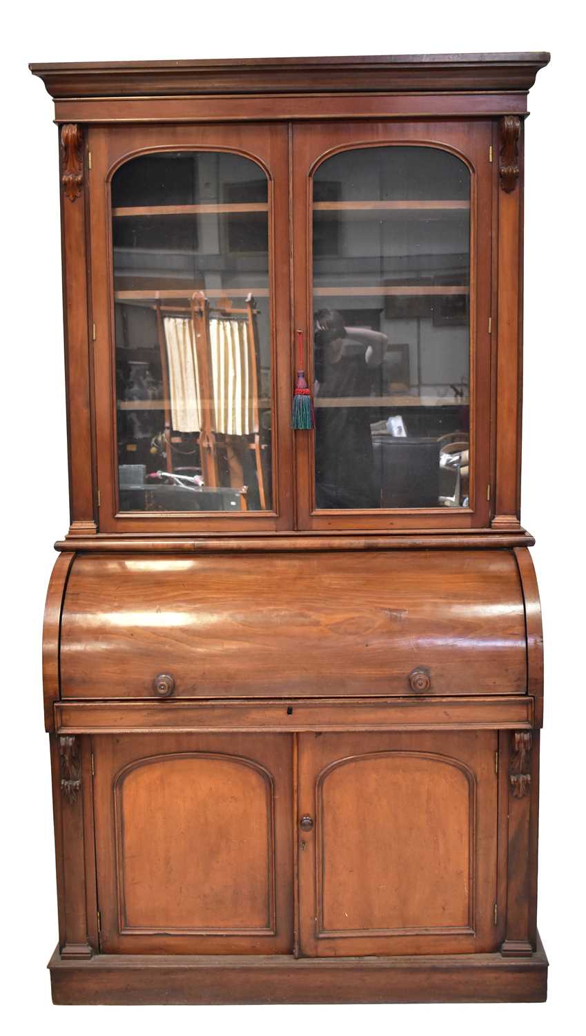 A Victorian mahogany bureau bookcase glazed top with cylinder top and fitted interior, slide-out