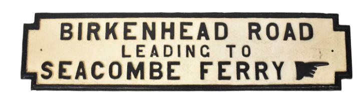 A cast iron sign 'Birkenhead Road Leading to Seacombe Ferry', with finger pointing to the right,