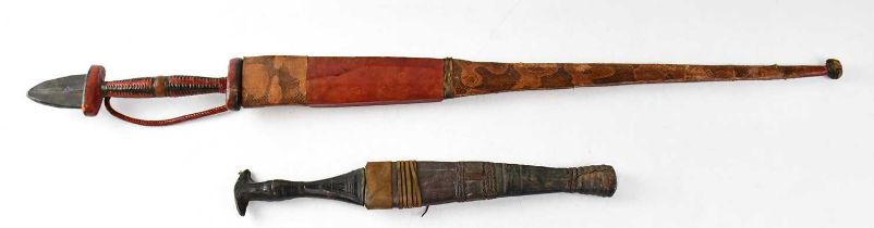 An African hunting sword with narrow 57cm double edged blade, possibly Sudanese Nubian Cloud