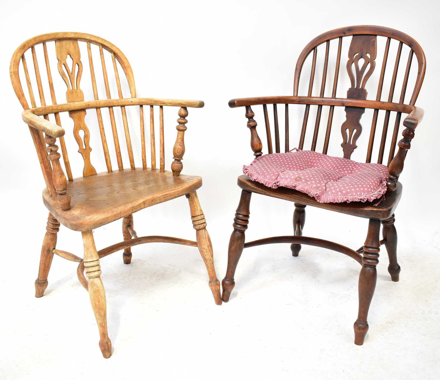 Two 19th century elm seated Windsor chairs (2).