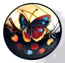 MOORCROFT; a pin dish decorated with butterfly and berries, copyrighted for 2002, with impressed and