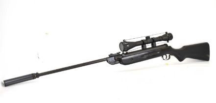 A .22 break barrel air rifle, with later painted black stock, with scope and moderator, also with