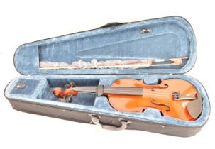 A student three-quarter violin and bow, in carry case.