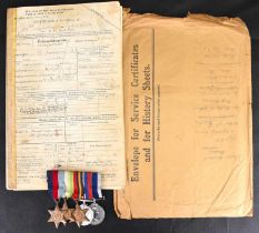 A WWII group of four medals comprising the 1939-45 War Medal, Burma, Atlantic and 1939-45 Star,