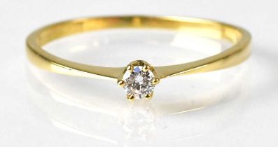 An 18ct yellow gold diamond solitaire ring, size P, approx. 1.2g. Condition Report: - Shank